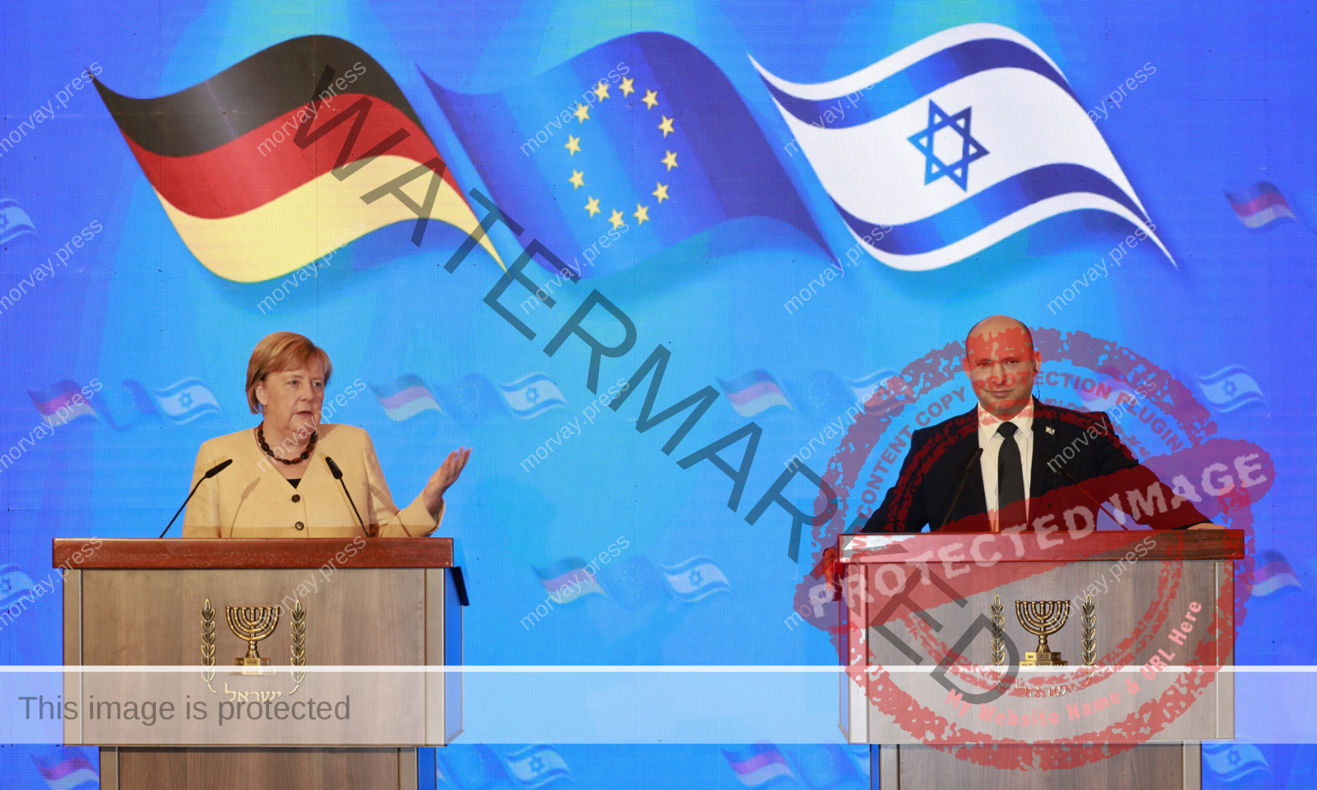 German Chancellor Angela Merkel and Israeli Prime Minister Naftali Bennett give a joint press conference following a ca